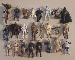 lot 150 image: (24) COLLECTIBLE FIGURES INCLUDING STAR WARS AS SHOWN. (SOLD 24 X THE MONEY)