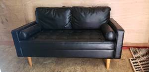 lot 12 image: Small Faux Leather Ikea Loveseat