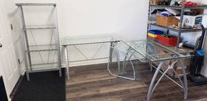 lot 27 image: Realspace Vista Glass 76W L-Shape Corner Desk with Matching 60H 4-Shelf GlassMetal Bookcase