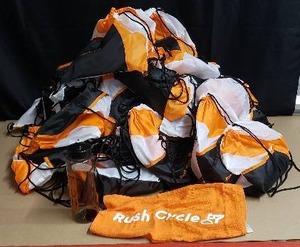 lot 37 image: Lot of 40 Rush Cycle Drawstring Gym Bags with 32 oz Water Bottles