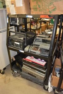 lot 112 image: Rolling PLX Mobile TV Cart CONTENTS NOT INCLUDED (PICKUP WED BETWEEN 3P-6P)