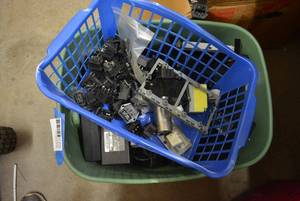 lot 134 image: Tub of Battery Adapters and Plugs