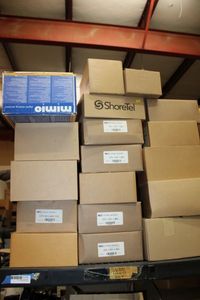 lot 195 image: Office Phones in Boxes