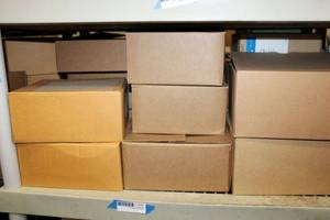 lot 200 image: Office Phones in Boxes
