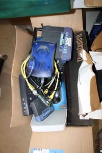 lot 210 image: Wireless Mouse, Linksys and Netgear Routers