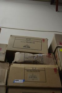 lot 70 image: 3 Light Fixtures Chandelier #3100256-PB and Chandelier #100255-CS, and 15 Truscan Glass Pendant Orb #102120ORB