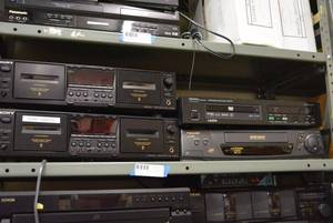 lot 77 image: Shelf Contents Sony Cassette Players, Denon DVD Player, Panasonic VHS Player