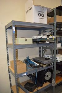 lot 23 image: Shelf Contents Etherjack, Multiport Racks, Computer to Video Scan Converter, LCD Monitors, Printers and More