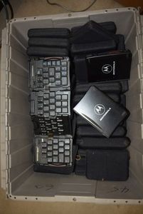 lot 42 image: Bin of Collapsible Motorola Keyboards