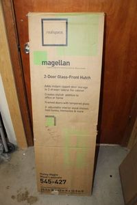 lot 5 image: Honey Maple Wood Laminate 2-Door Glass-Front Hutch by Magellan Unopened in Box