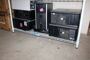 lot 403 image: Dell and HP Hard-drives (Bottom Shelf)