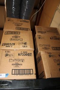 lot 457 image: 9 Boxes of Huggies Little Snugglers Preemie Diapers up to 6 lbs.