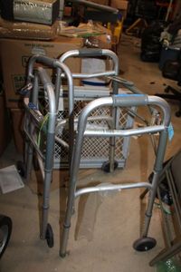 lot 503 image: 2 Folding Walkers and Plastic Dog Gate