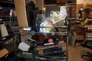 lot 529 image: Top 2 Bin of Wire Shelves Photo Frame, Leather Covers, Misc. Parts