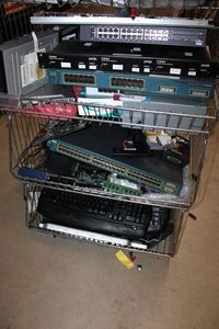 lot 528 image: Bottom 3 Shelves of Wire Shelving Keyboards, Multiports