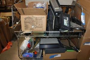 lot 292 image: CONTENTS OF TWO SHELVES, STILL IN BOX ITEMS, video switcher, power adapters and more