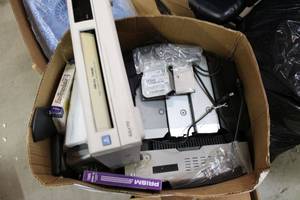 lot 356 image: Video Cassette Players, Minuteman Power Surge Boxes, and InFocus Projector