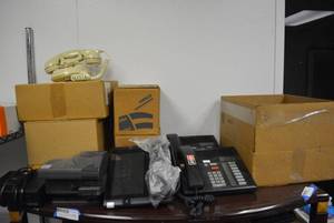 lot 558 image: Contents of Shelf Only Motorola Pager, Radio Shack Microphone System, Office Phone,