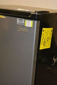 lot 573 image: Avanti Mini Frig - Still Plugged in and Cold CONTENTS NOT INCLUDED