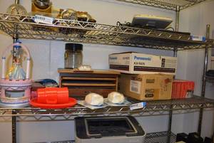 lot 551 image: Disney Princess Toy, Games, Coca-Cola Puzzle, Glade Plug-Ins, Panasonic Toner Cartridge, Red Skelton VHS Collection, Maxell Video Cassettes