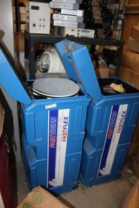 lot 628 image: Two FastSigns Cases