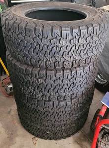 lot 5 image: (4) BF GOODRICH BAJA CHAMPION ALL-TERRAIN TA KO2 TIRES SIZE 35X12.50R20LT WITH LESS THAN 2000 MILES ON THEM. CHECK THESE OUT (SOLD 4 X THE MONEY)