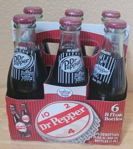 lot 13 image: COLLECTIBLE GLASS BOTTLE DUBLIN DR. PEPPER 8OZ IMPERIAL CANE SUGAR 6-PACK WITH CARRIER AS SHOWN. SEARCH IT UP