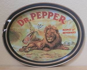 lot 14 image: VINTAGE 1979 DR. PEPPER LION KING OF BEVERAGES OVAL ADVERTISING TIN TRAY AS SHOWN. 14.5 W x 11.5 H.