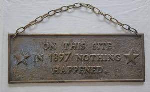 lot 24 image: VINTAGE STYLE SOLID BRASS PLAQUE IN STYLE SHOWN. APPROX. 12.25 W x 4.5 H.