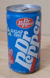 lot 42 image: UNIQUE FIND RARE VINTAGE 1984 SUGAR FREE DR. PEPPER WELCOME HOME ARMY VS. NAVY 12 OZ COMMEMORATIVE UNOPENED CAN AS SHOWN. INTERESTINGLY, IT WAS CANNED BY THE COCA-COLA BOTTLING CO.