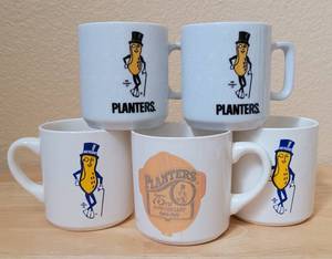 lot 45 image: (5) VINTAGE PLANTERS COFFEE CUPS INCLUDING 75TH ANNIVERSARY 1981 AS SHOWN.