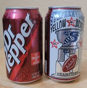 lot 51 image: (2) 1998 DR. PEPPER STEPHENVILLE YELLOW JACKETS UIL 4A STATE CHAMPIONS COMMEMORATIVE 12 OZ UNOPENED CANS AS SHOWN. (SOLD 2 X THE MONEY)