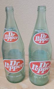 lot 71 image: (2) VINTAGE DR. PEPPER 32 OZ GLASS BOTTLES AS SHOWN. (SOLD 2 X THE MONEY)