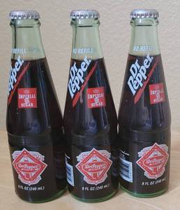 lot 72 image: (3) VINTAGE DR. PEPPER DUBLIN, TEXAS 8 OZ UNOPENED BOTTLES AS SHOWN. (SOLD 3 X THE MONEY)