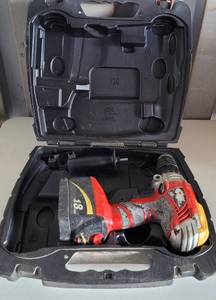 lot 12 image: SKIL XDRIVE 18V CORDLESS DRILL WITH HANDLE, BATTERY AND CASE AS SHOWN. NO CHARGER.