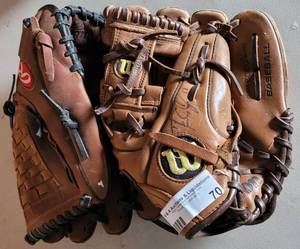 lot 70 image: (2) BASEBALL GLOVES AS SHOWN.