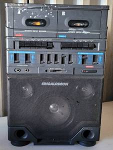 lot 103 image: SINGALODEON DOUBLE CASSETTE SING-ALONG SYSTEM MODEL K-7 AS SHOWN.