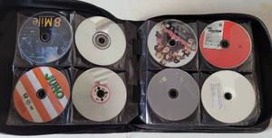 lot 106 image: BINDER FULL OF DVD MOVIES AS SHOWN. GENEROUS COUNT