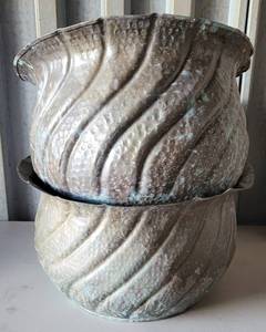 lot 115 image: (2) LARGE METAL PLANTERS AS SHOWN. SOLD 2 X THE MONEY APPROX. 17 W x 10 H EACH.