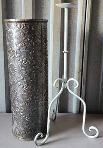 lot 116 image: (1) EMBOSSED METAL VASE AND (1) WROUGHT IRON CANDLE HOLDER AS SHOWN. APPROX. (VASE) 7 W x 20 H. (CANDLE HOLDER) 11.5 W x 23 H.