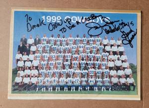 lot 152 image: SIGNED 1999 DALLAS COWBOYS TEAM PICTURE AS SHOWN. APPEARS TO BE SIGNED BY JERRY JONES AND GENE JONES. AUTHENTICITY UNKNOWN.