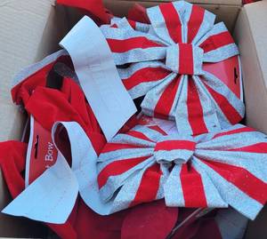lot 153 image: BOX LOT OF ASSORTED DECORATIVE BOWS WITH TAGS AS SHOWN. GENEROUS COUNT.