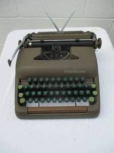 lot 5 image: Vintage - Working-1949 Smith -Corona Sterling Portable Typewriter In Case With Manual and Extra Ribbon