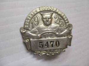 lot 36 image: 1925 COLORADO LICENSED DRIVER (CHAUFFER) BADGE #5470
