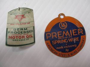 lot 38 image: 2-Light Tin Advisement TagsPins, 1-2-Sided-PREMIER SPRING WIRE, 1-Conoco Germ Processed Oil Pin