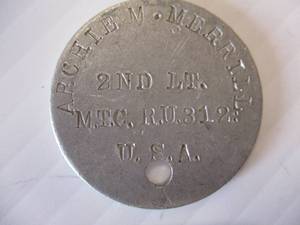 lot 51 image: WW-1  Round  Military Metal I.D.  Dog Tag, 2Nd Lt. Archie M. Merrill, M.T.C, R.U.312, U.S.A.