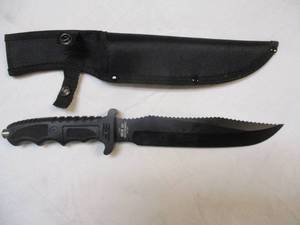 lot 76 image: SURVIVOR-Hunting Knife Model # HK718 Outdoor Fixed Stainless-Steel Blade, Serrated Back, With Glass Breaker And Sheath,