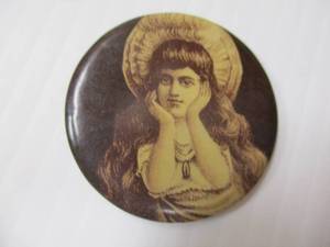 lot 107 image: Early 1900s Risque Pocket Mirror of Pretty Woman
