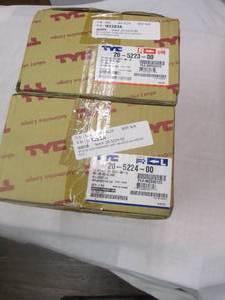 lot 140 image: 2-NEW-1998-99-Nissan Altima Both Left and Right Replacement Front Headlight Assembly With Bulb In Box.