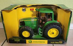 lot 1 image: ERTL JOHN DEERE 116 DIE CAST METAL TRACTOR IN ORIGINAL BOX AS SHOWN.